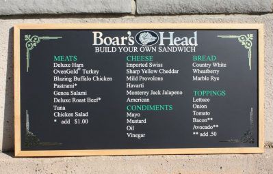 Boar's head chalkboard designed menu