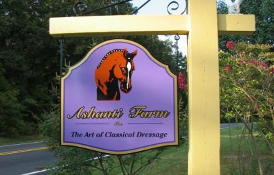 Ashanti Farm hanging posted exterior sign