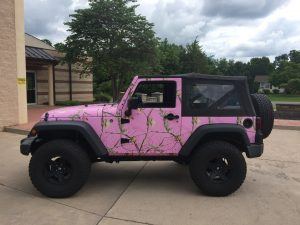 pink jeep with color-change full vehicle wrap